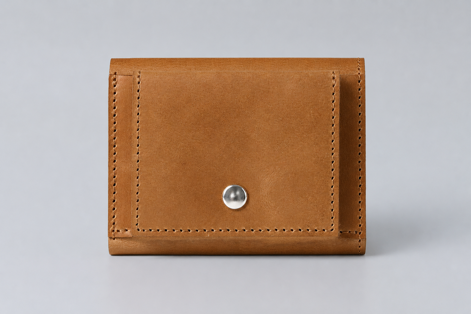 MC-keywallet。蔵前の革職人が製作した国産牛革のキーケース一体型ミニ財布。ブラウン。表面のイメージ。