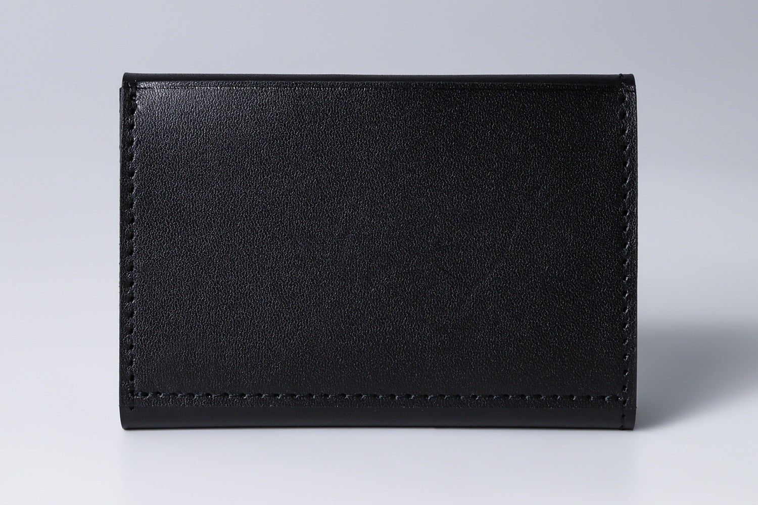 MC-miniwallet。蔵前の革職人が製作した国産牛革のミニ財布。ブラック。裏面のイメージ。
